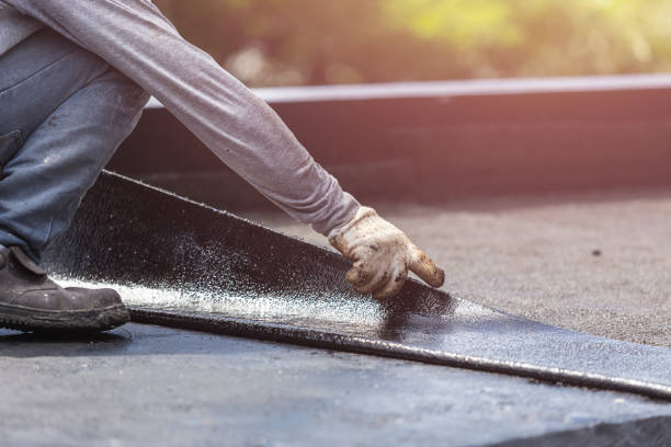 Professional Basement Waterproofing technician working in Houghton, NY